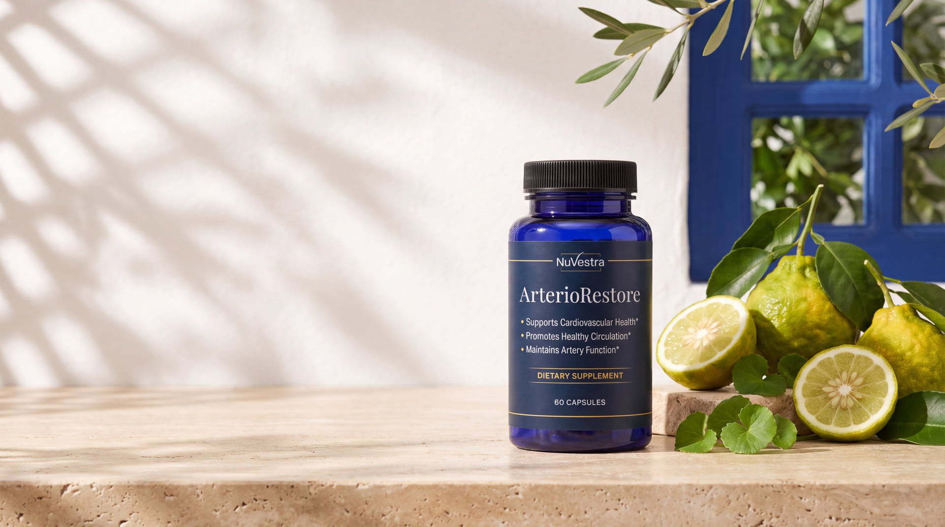 An ArterioRestore bottle standing on a sunlit stone counter beside whole and halved bergamot, with lattice window shadows falling across the plaster wall behind it